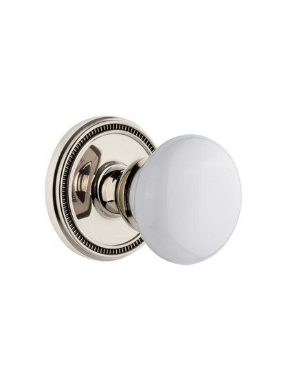 Grandeur Soleil Rosette Door Set with Hyde Park Porcelain Knobs in Polished Nickel.